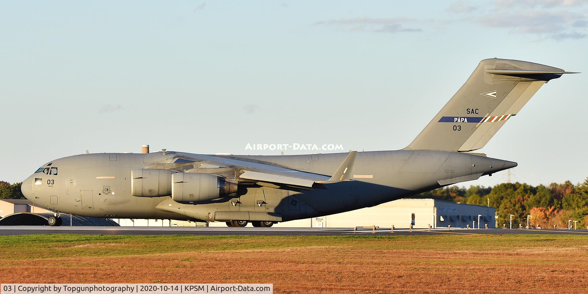 03, 2009 Boeing C-17A Globemaster III C/N F-211, BARTK C-17 taking the active runway.