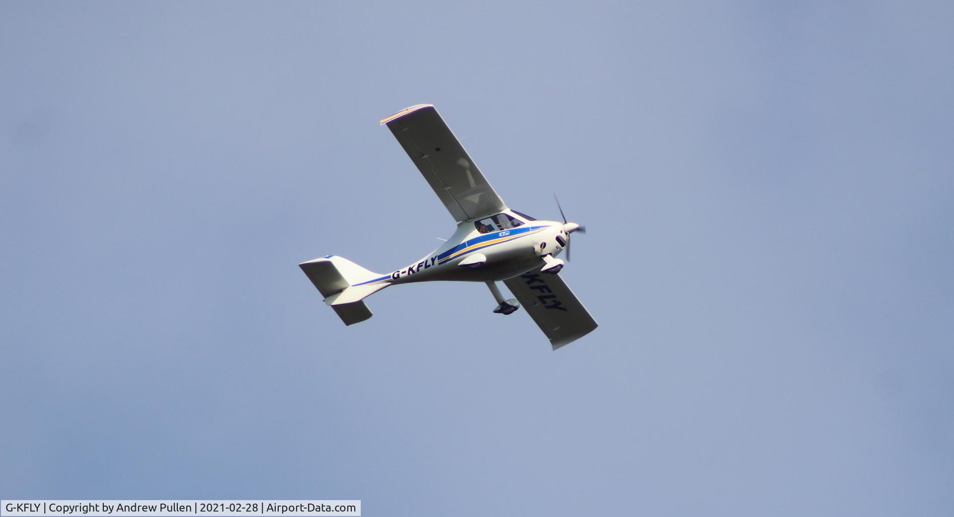 G-KFLY, 2007 Flight Design CTSW C/N 8244, Snapped this as it was flying over the river Great Ouse between Swavesey and Over in Cambridgeshire on 28th February 2021. 
I used a Canon 200D and an old pre-digital Canon EOS 75-300 zoom lens.