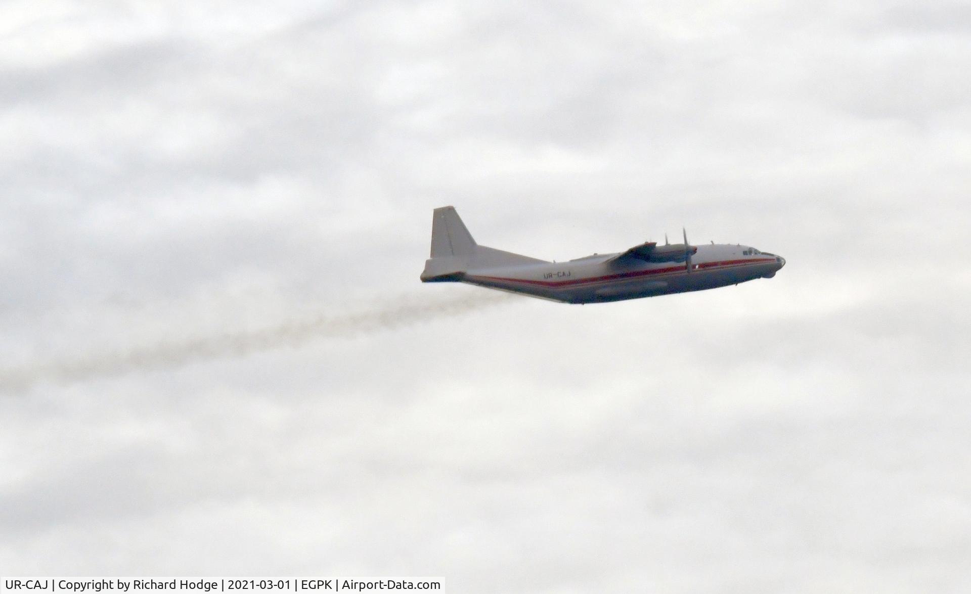 UR-CAJ, Antonov An-12BK C/N 8346106, Departing Prestwick.
