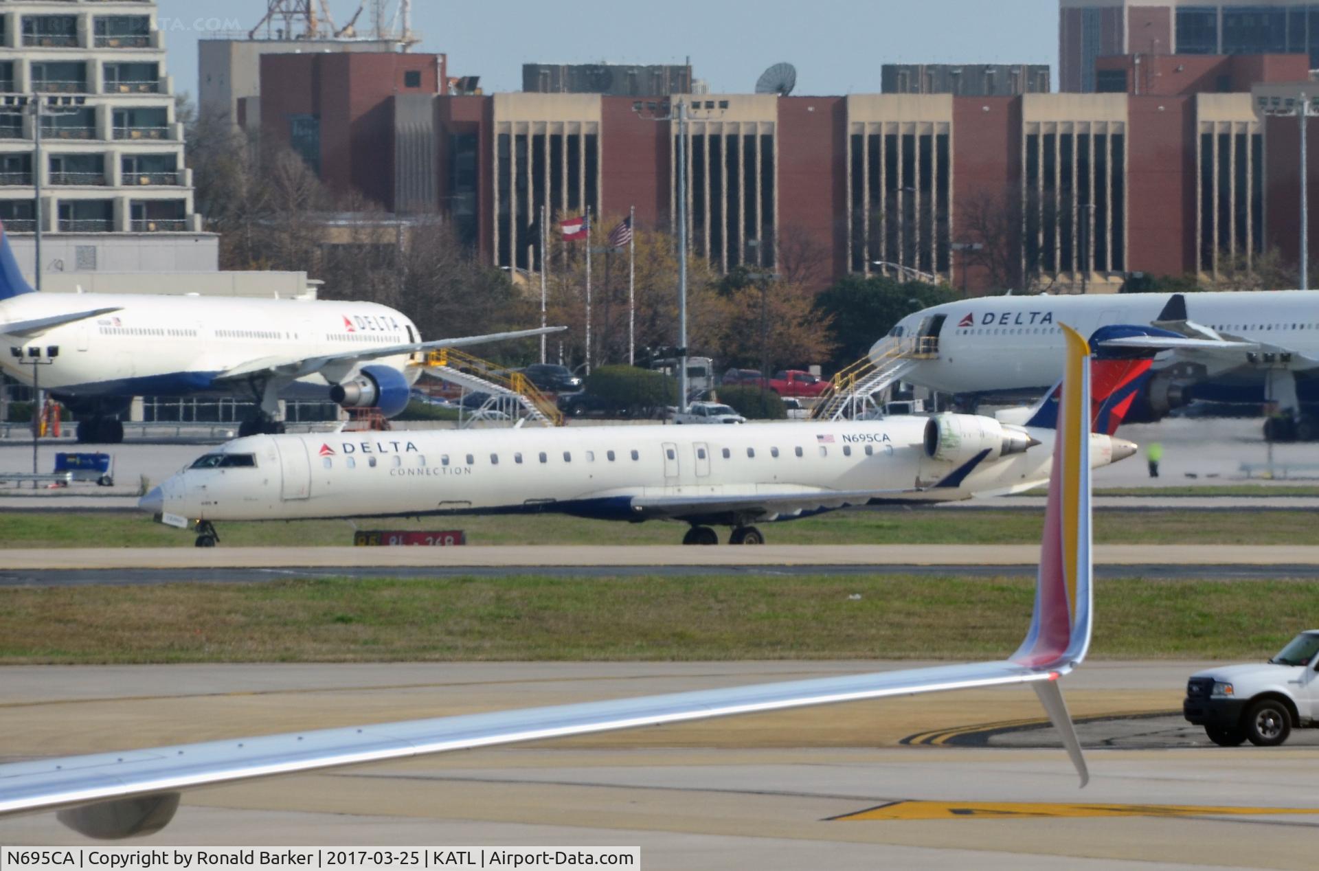 N695CA, 2006 Bombardier CRJ-900ER (CL-600-2D24) C/N 15097, Taxi Atlanta
