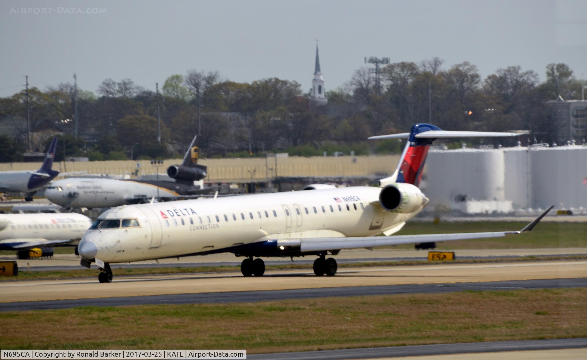 N695CA, 2006 Bombardier CRJ-900ER (CL-600-2D24) C/N 15097, Taxi Atlanta