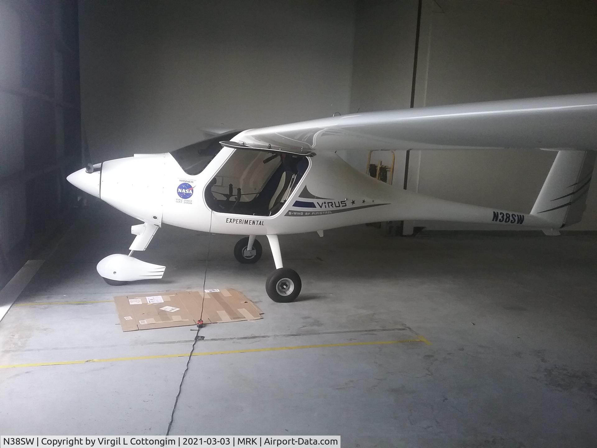 N38SW, 2010 Pipistrel Virus SW C/N 371 VSW 100, Glider in a hanger at Marco Island, Florida Executive airport. My friend Bob said he had just bought it.