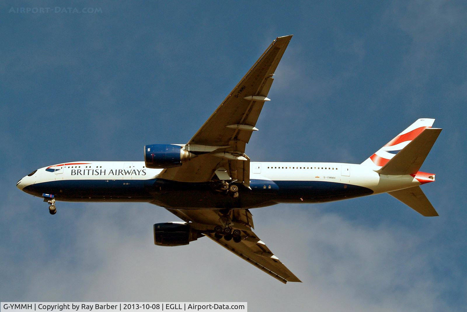 G-YMMH, 2000 Boeing 777-236/ER C/N 30309, G-YMMH   Boeing 777-236ER [30309] (British Airways) Home~G 08/10/2013. Incorporates a panda face around the cockpit area advertising its China service.