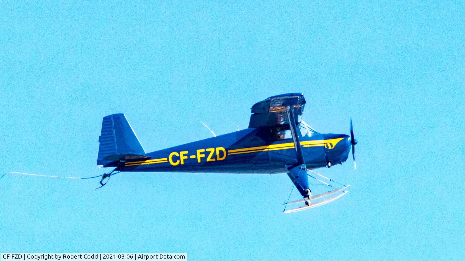 CF-FZD, 1947 Luscombe 8E Silvaire C/N 5302, Interesting and historic tail-dragger seen in flight above ice covered Midland Bay, part of Georgian Bay
