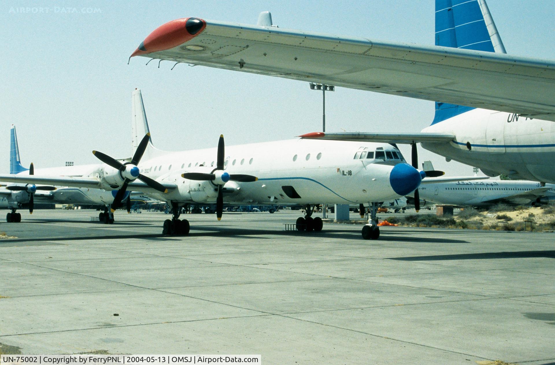 UN-75002, Ilyushin Il-18 V C/N Not found UN-75002, Irbis L18 parked in between 2 sister ships