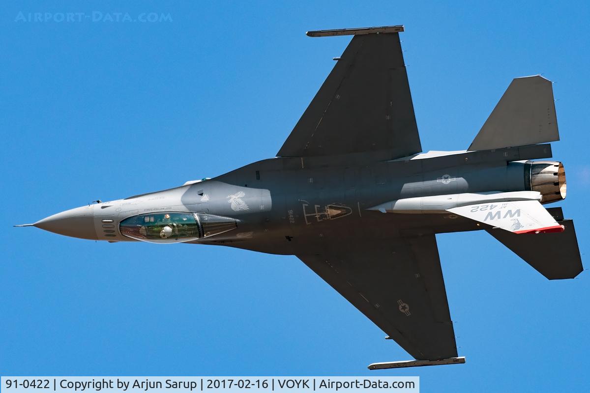 91-0422, 1991 General Dynamics F-16CM Fighting Falcon C/N CC-120, “Punch” rolling into the inverted over the active at Aero India 2017 on a clear day. This PACAF Demo Team F-16 has been drawn from the 13th FS “Panther Pack” based at Misawa, Japan.