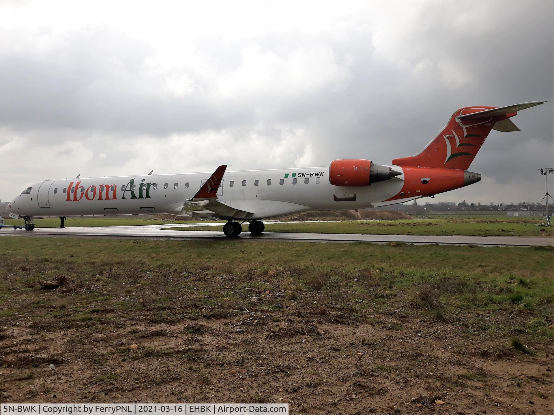 5N-BWK, 2011 Bombardier CRJ-900LR (CL-600-2D24) C/N 15271, Ibom Air CL900 being towed to its storage location