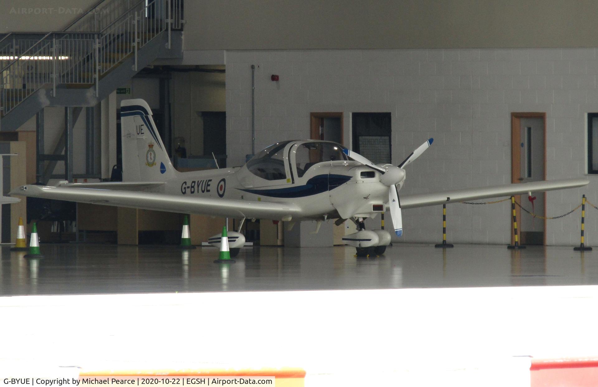 G-BYUE, 1999 Grob G-115E Tutor T1 C/N 82090/E, Parked in the SaxonAir hangar, prior to receiving black wrapping.