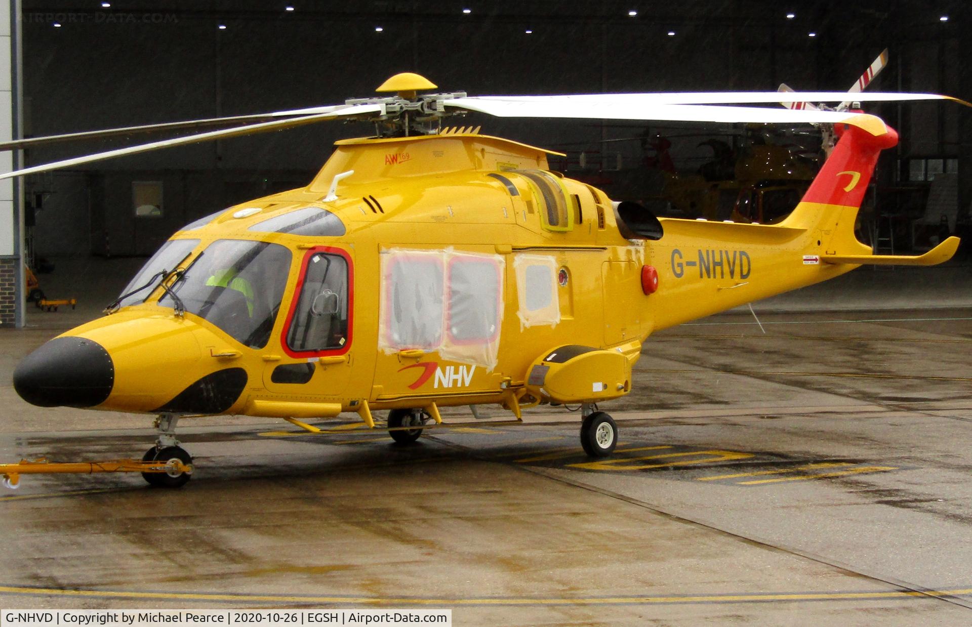 G-NHVD, 2019 Leonardo AW-169 C/N 69113, Under tow into the company hangar, just re-registered from D-HHPJ.