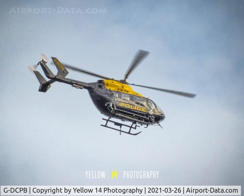 G-DCPB, 2009 Eurocopter-Kawasaki EC-145 (BK-117C-2) C/N 9265, G-DCPB NPAS Police Eurocopter hovering above my house a couple of days ago.
