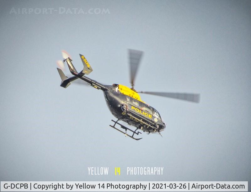 G-DCPB, 2009 Eurocopter-Kawasaki EC-145 (BK-117C-2) C/N 9265, NPAS Police Eurocopter hovering above my house a couple of days ago.