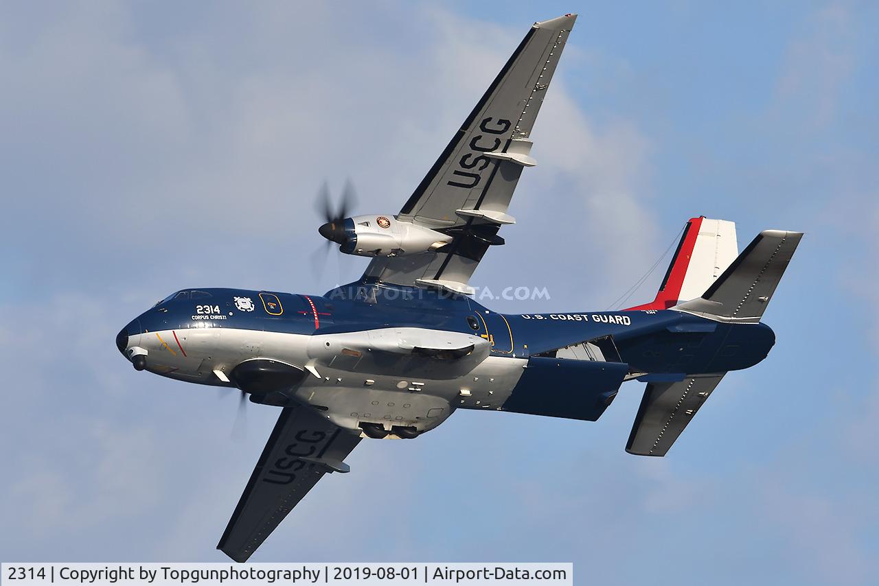 2314, 2014 Airtech HC-144A Ocean Sentry (CN-235M-300) C/N C203, Bicentennial Pained Ocean Sentry flying over the USCG Cutter Eagle