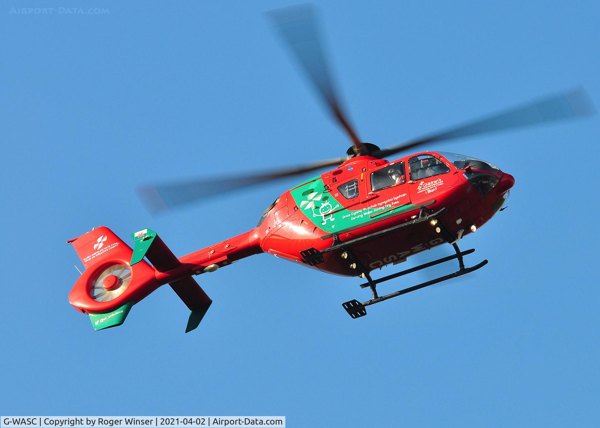 G-WASC, 2012 Eurocopter EC-135T-2+ C/N 1074, Off airport. Wales Air Ambulance helicopter (Helimed 57) low over Swansea, Wales, UK.