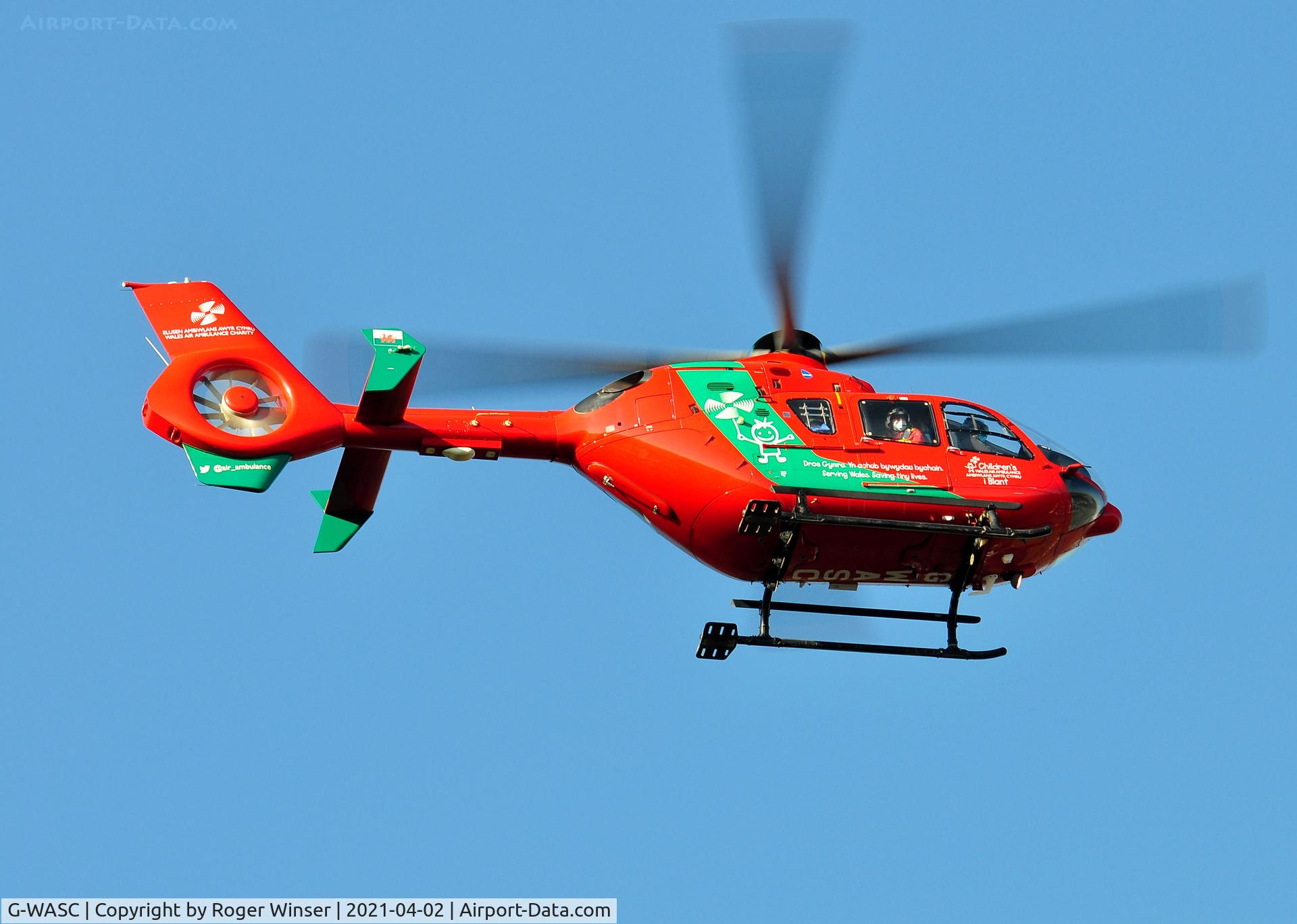 G-WASC, 2012 Eurocopter EC-135T-2+ C/N 1074, Off airport. Wales Air Ambulance helicopter (Helimed 57) low over Swansea, Wales, UK