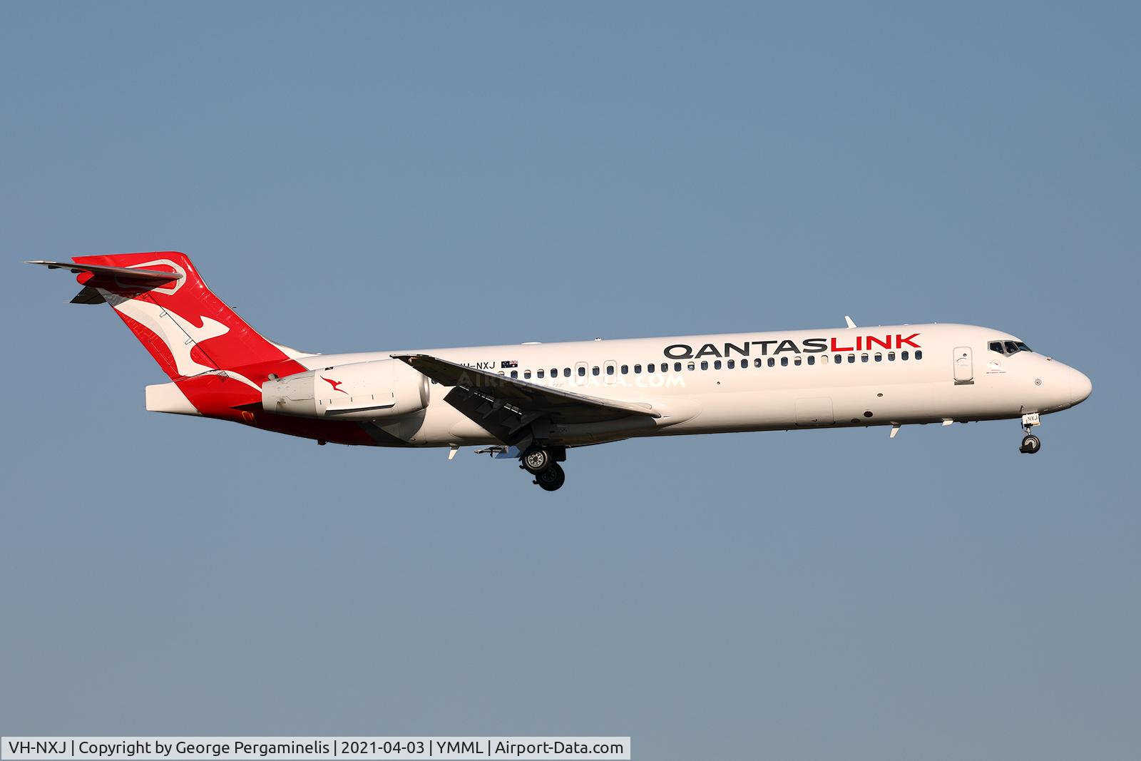 VH-NXJ, 2003 Boeing 717-200 C/N 55166, Short final for runway 34.