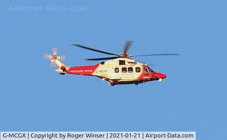 G-MCGX, 2018 Leonardo AW189 C/N 92010, Off airport near Swansea Airport (EGFH). Rescue 187 returning to base at St Athan Airfield, Wales.