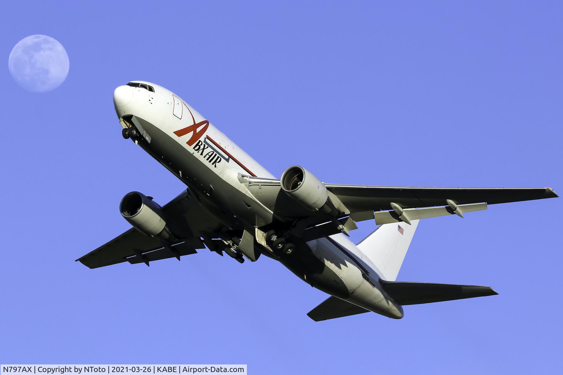 N797AX, 1985 Boeing 767-281 C/N 23147, Departing with the moon in the background.