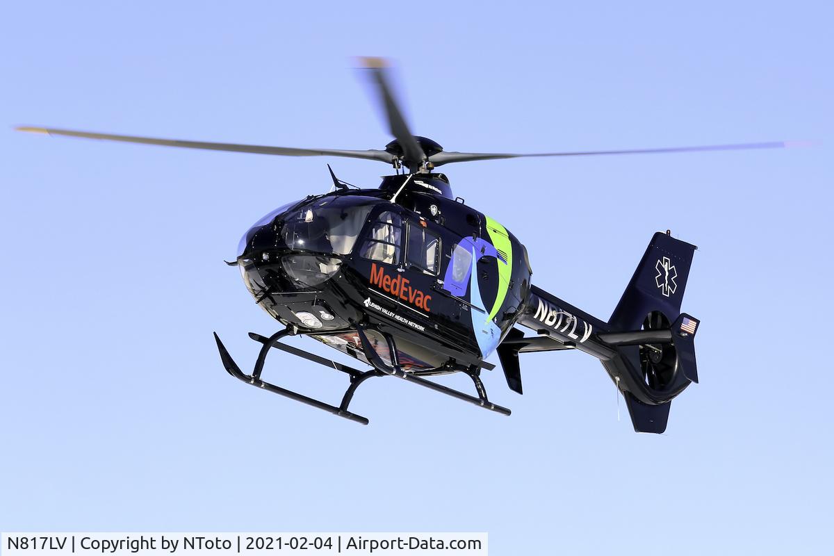N817LV, 2008 Eurocopter EC-135P-2+ C/N 0651, Inbound for a transfer with a snow belly.