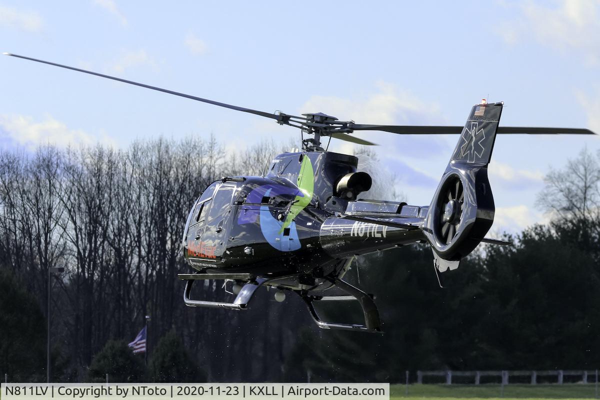 N811LV, 1998 Eurocopter-Kawasaki BK-117C-1 C/N 7527, Departing with some dirt flying around from the rotors.