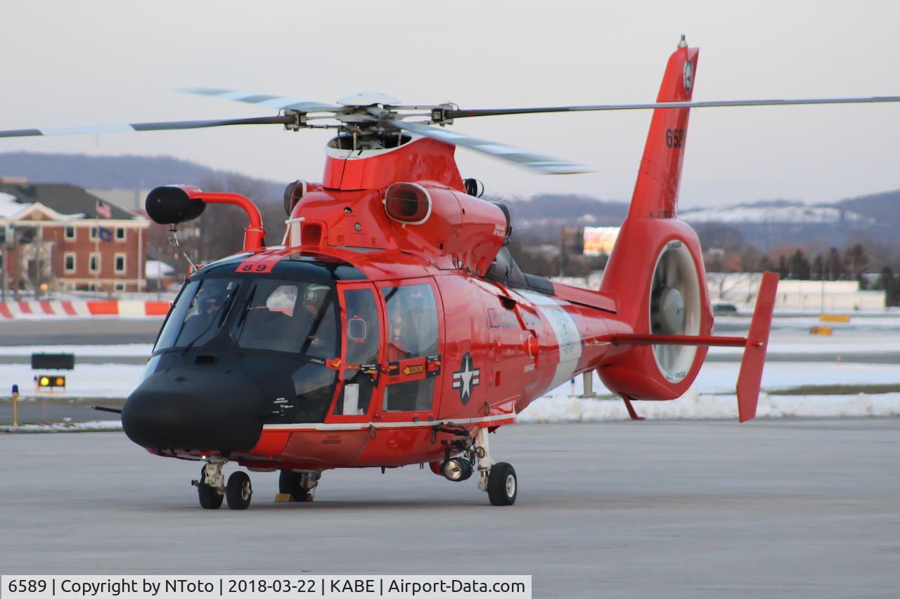 6589, 1988 Aerospatiale HH-65C Dolphin C/N 6289, Resting on the ramp after a training flight.