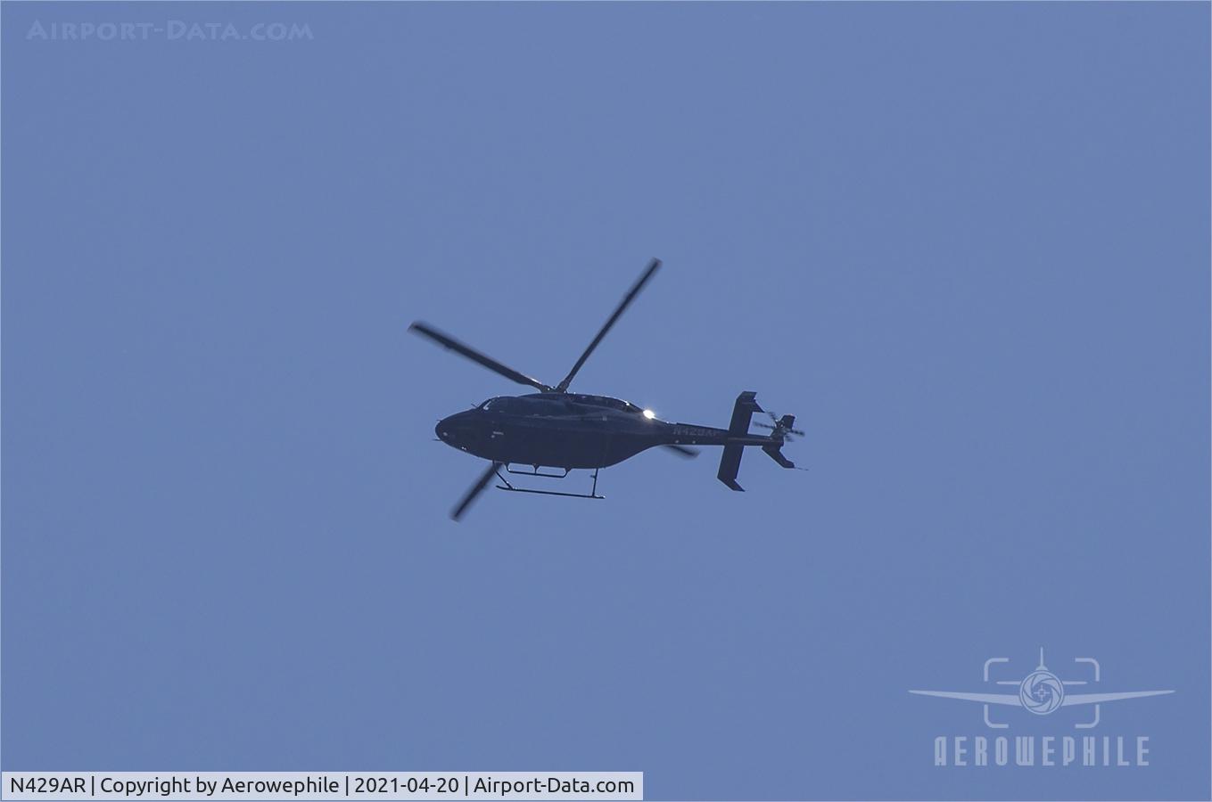 N429AR, 2011 Bell 429 GlobalRanger C/N 57035, Passing over Bristol Motor Speedway.