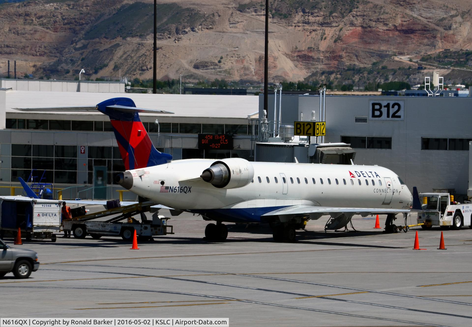 N616QX, 2003 Bombardier CRJ-701 (CL-600-2C10) C/N 10128, Gate B12 SLC