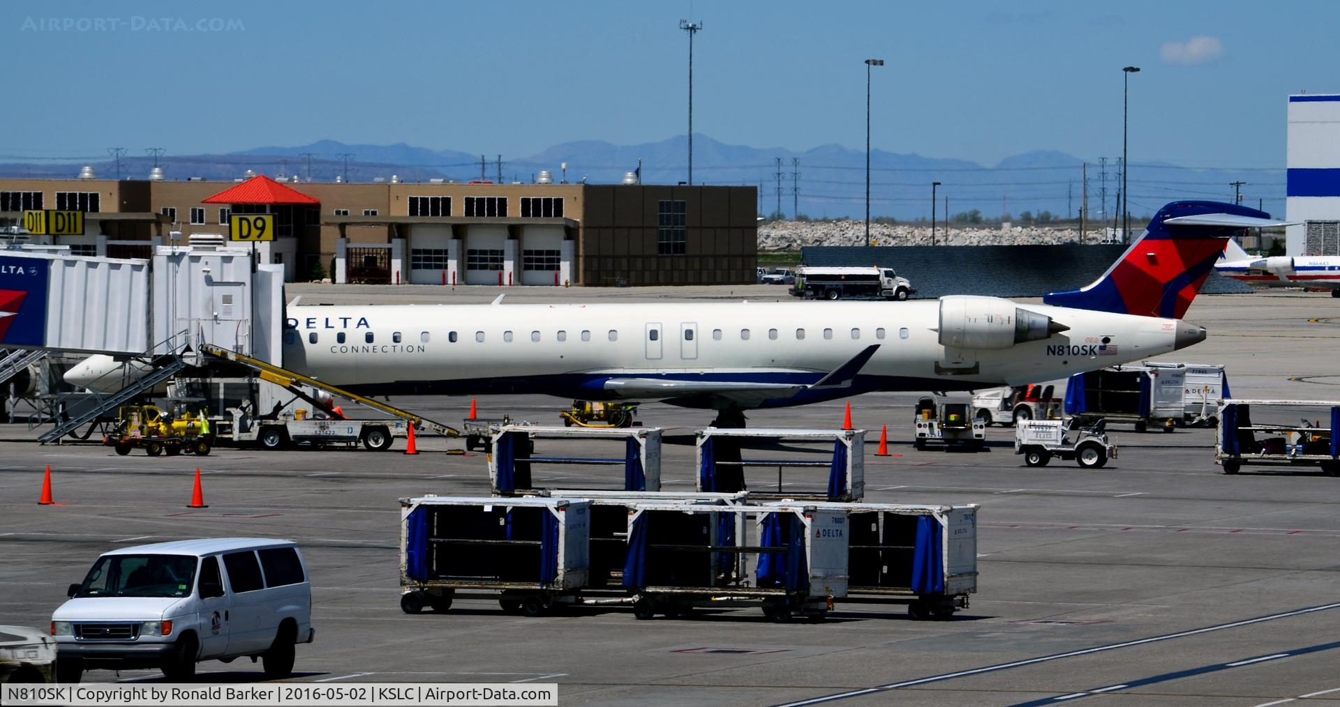 N810SK, 2006 Bombardier CRJ-900ER (CL-600-2D24) C/N 15093, Gate D9 SLC