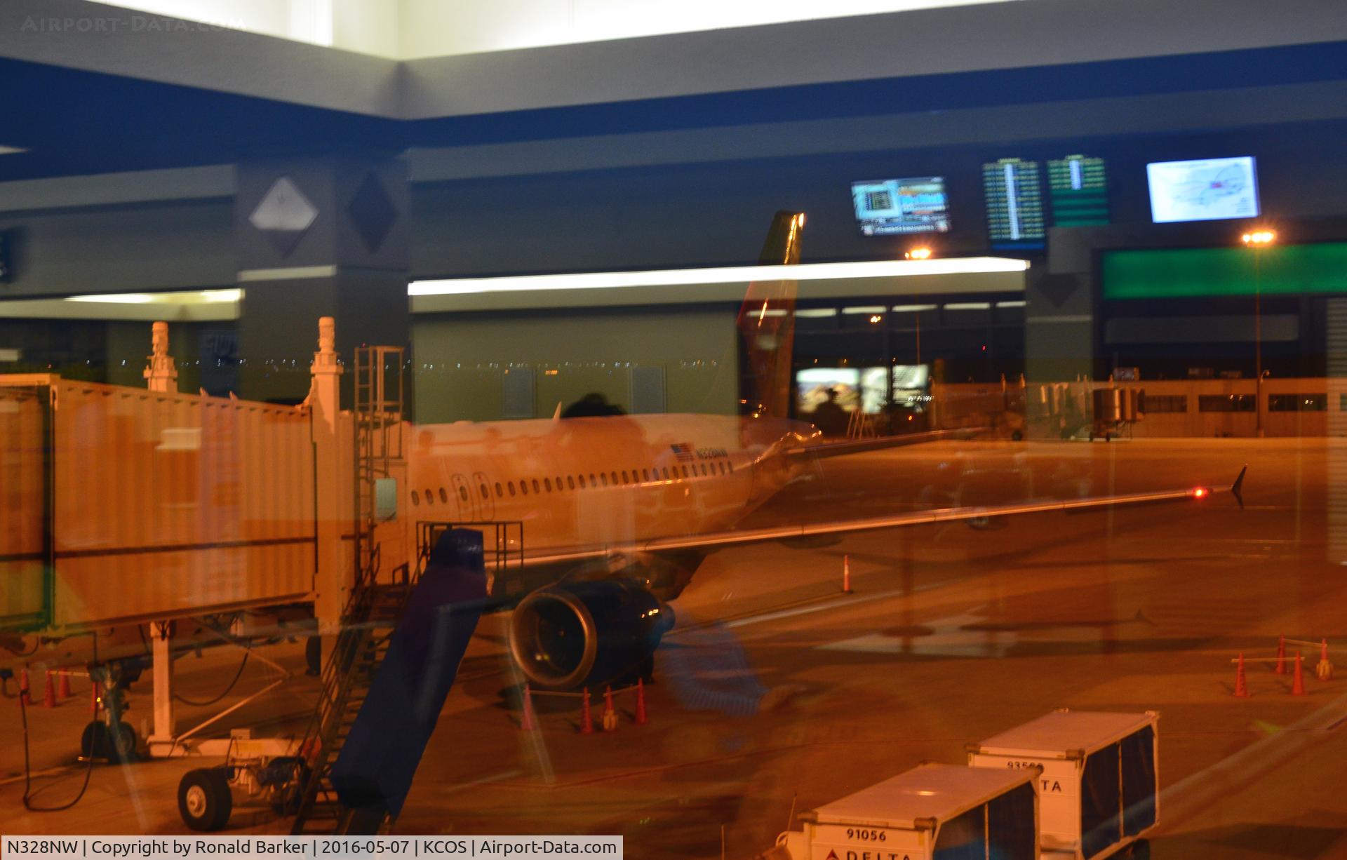 N328NW, 1992 Airbus A320-211 C/N 298, At the gate COS