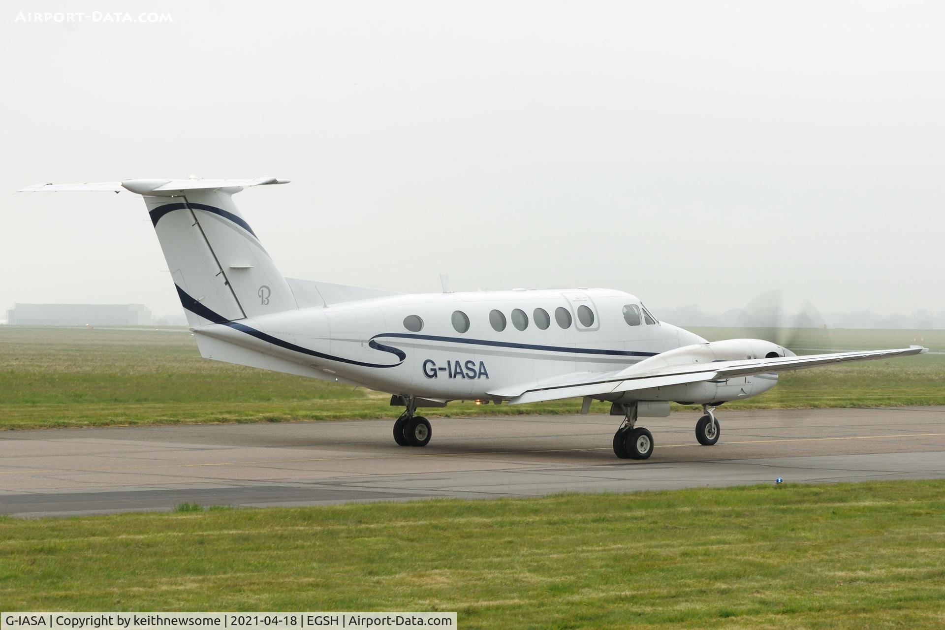 G-IASA, 1999 Raytheon B200 King Air C/N BB-1698, Leaving Norwich.