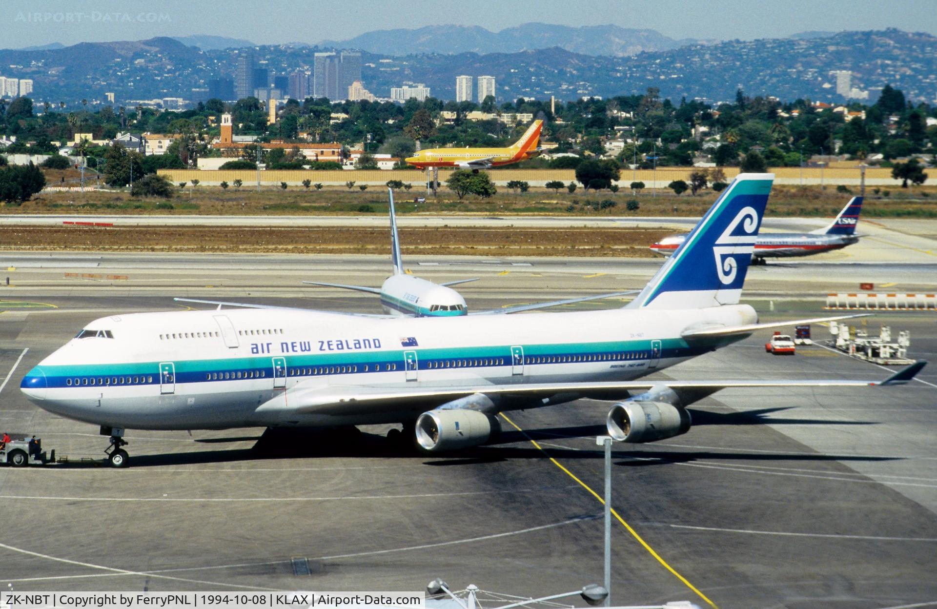 ZK-NBT, 1990 Boeing 747-419 C/N 24855, ANZ B744 needs a tug to the gate