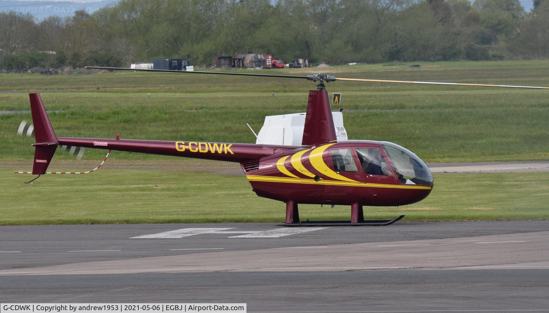 G-CDWK, 2006 Robinson R44 Raven II C/N 11116, G-CDWK at Gloucestershire Airport.