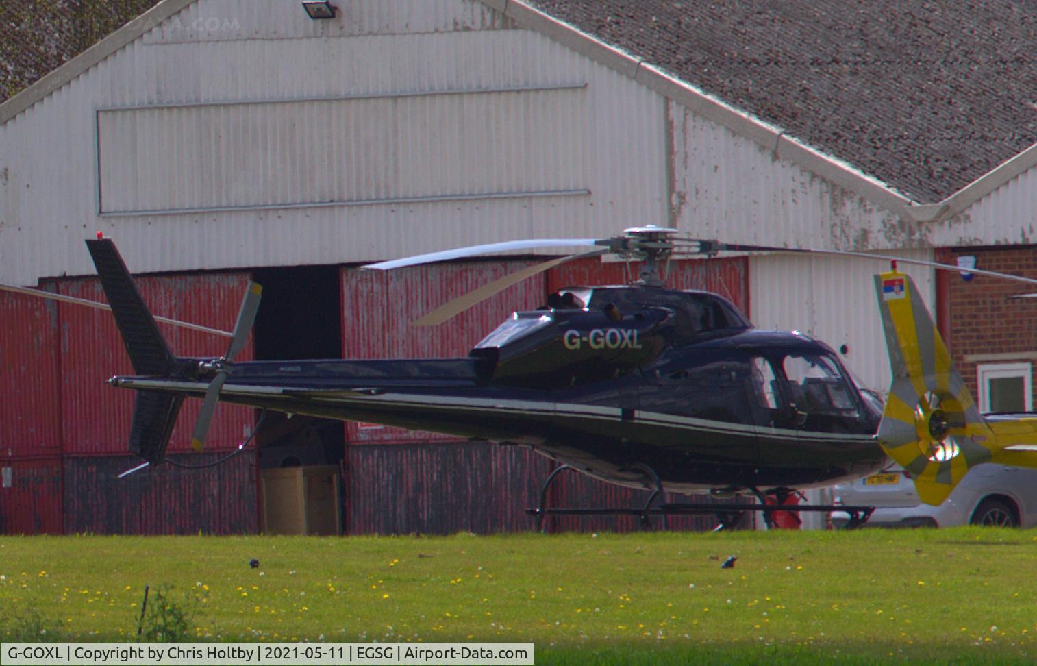 G-GOXL, 1982 Aerospatiale AS-355F-2 Ecureuil 2 C/N 5193, Parked outside hangar at its base at Stapleford Tawney