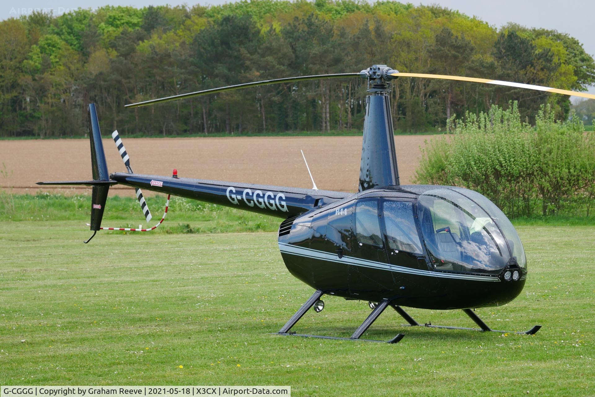 G-CGGG, 1999 Robinson R44 Astro C/N 0626, Parked at Northrepps.