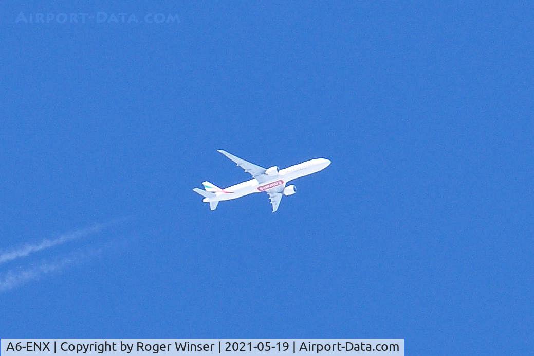 A6-ENX, 2014 Boeing 777-31H/ER C/N 42318, OTT. Seen at 35000 feet east bound over Swansea, Wales, UK. Operated by Emirates Airlines.