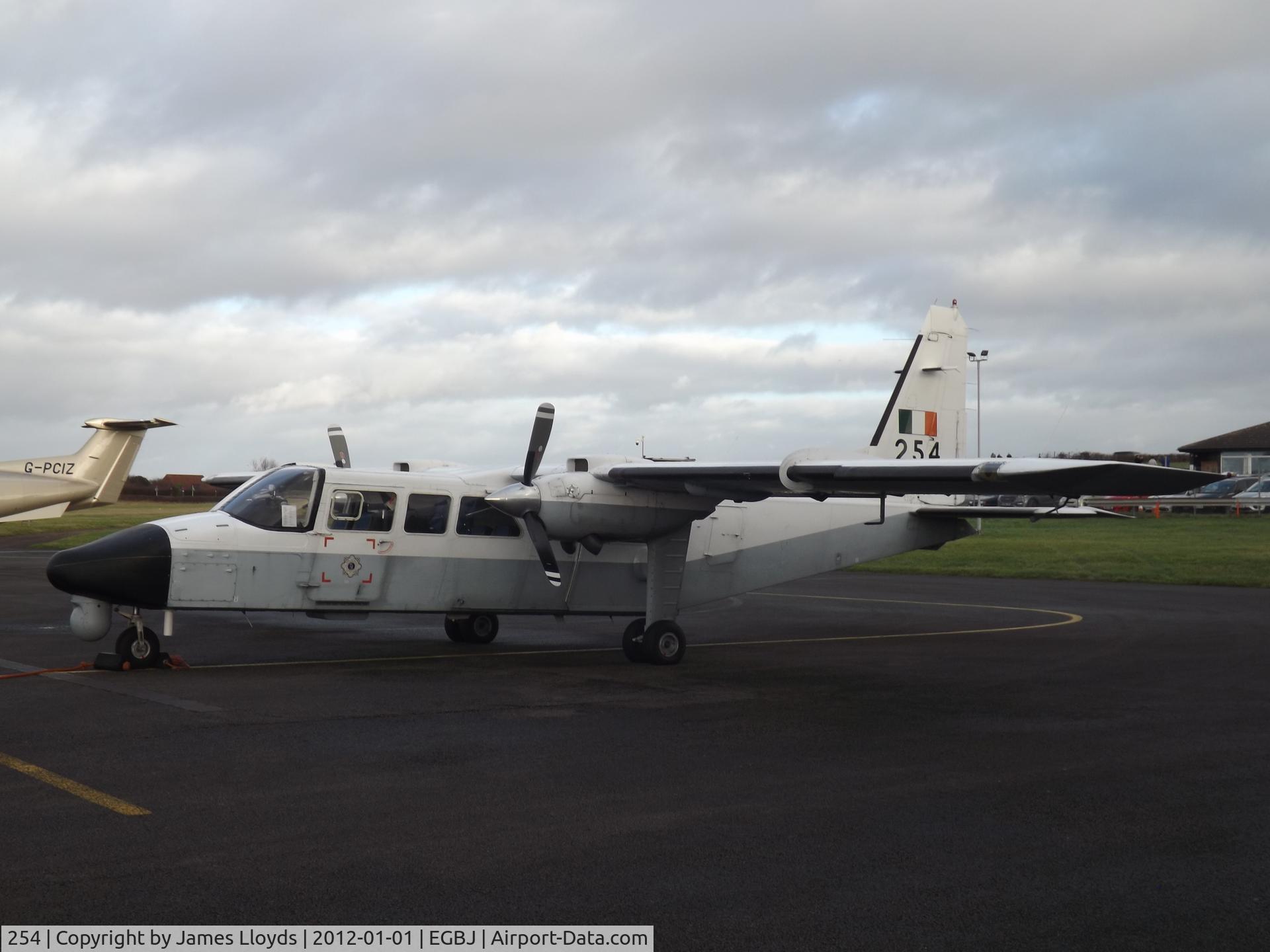 254, 1997 Pilatus Britten-Norman BN-2T-4S Defender 4000 C/N 4008, At Gloucestershire Airport.