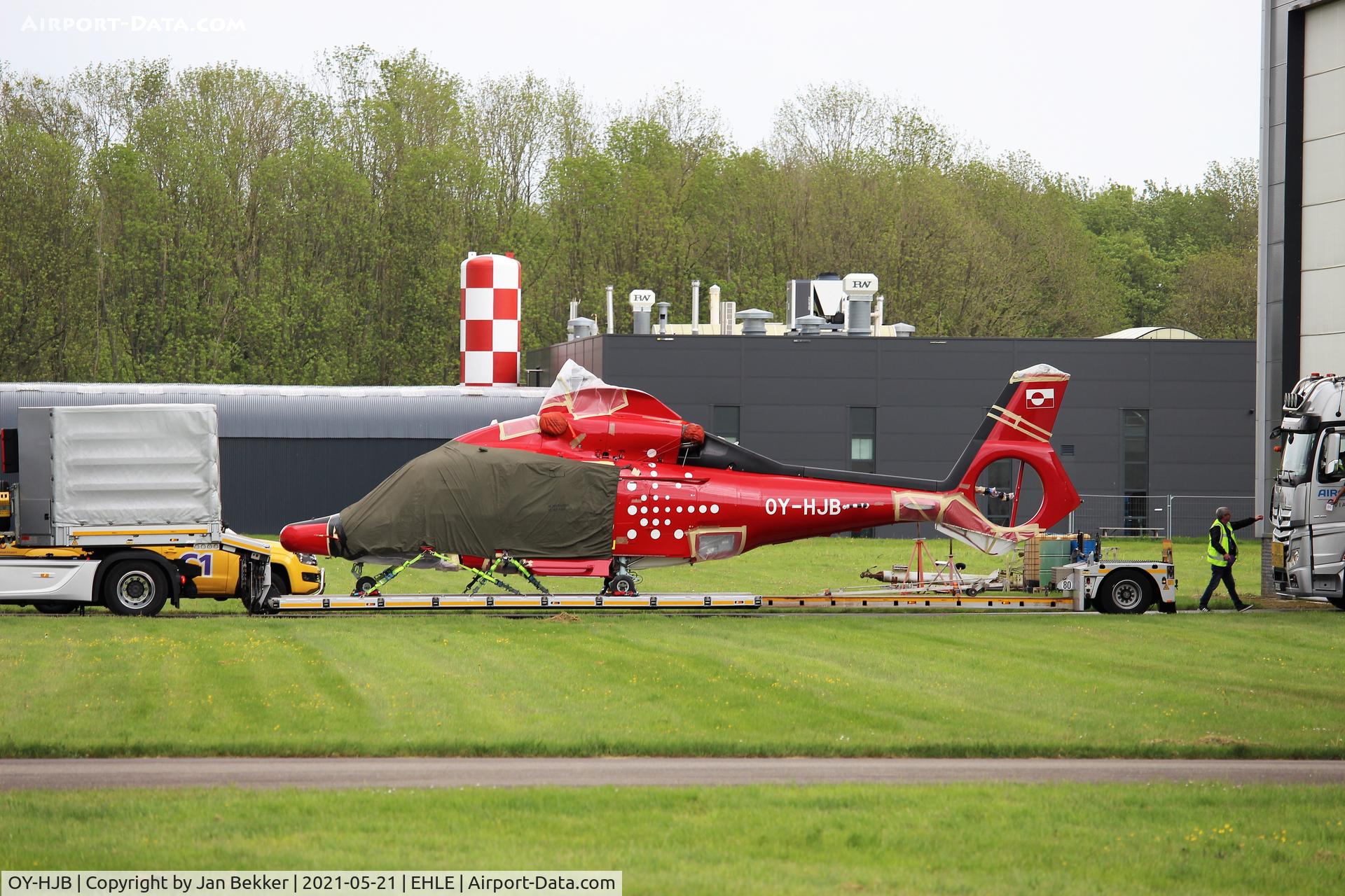 OY-HJB, 2009 Eurocopter EC-155B-1 C/N 6871, Just got an new livery (Groenland Air) and leaves the Satys hangar on a trailer