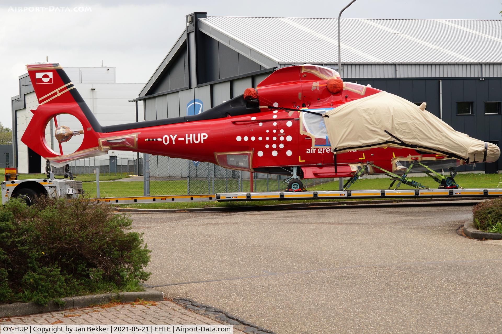 OY-HUP, 2004 Eurocopter EC-155B-1 C/N 6681, Former D-HNHE . Air Greenland. Just got its new livery at Lelystad Airport by Satys and is now transported by road to Ostende for the final assembling before flying to Greenland