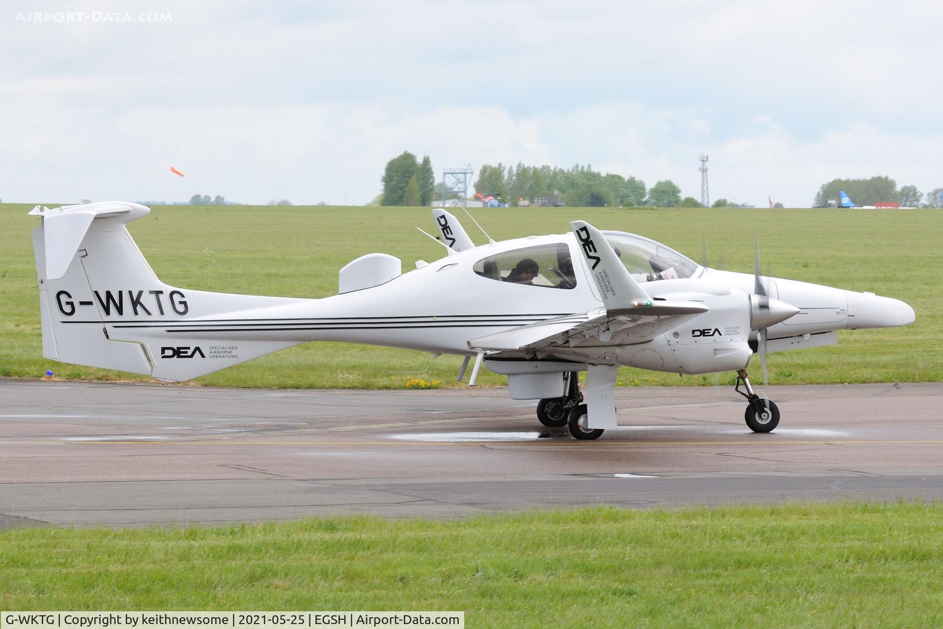 G-WKTG, 2009 Diamond DA-42M-NG Twin Star C/N 42.MN.001, Leaving Norwich.