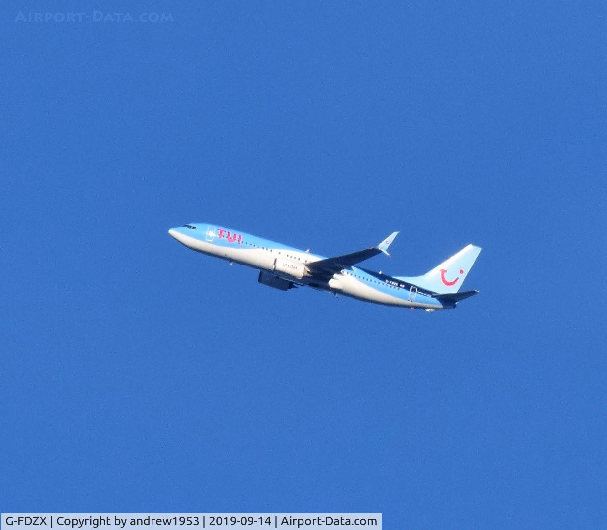 G-FDZX, 2011 Boeing 737-8K5 C/N 37258, G-FDZX over the Bristol Channel.