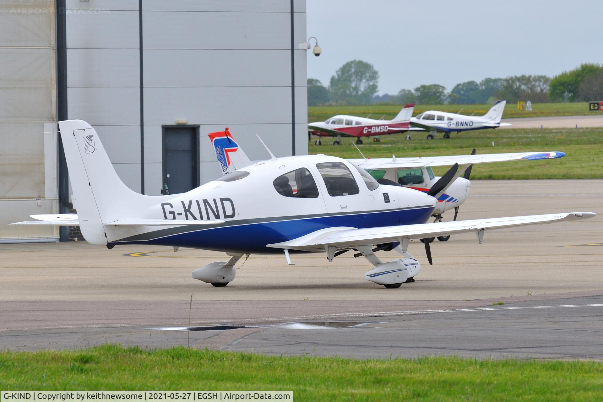 G-KIND, 2009 Cirrus SR20 C/N 1341, Parked at Norwich.