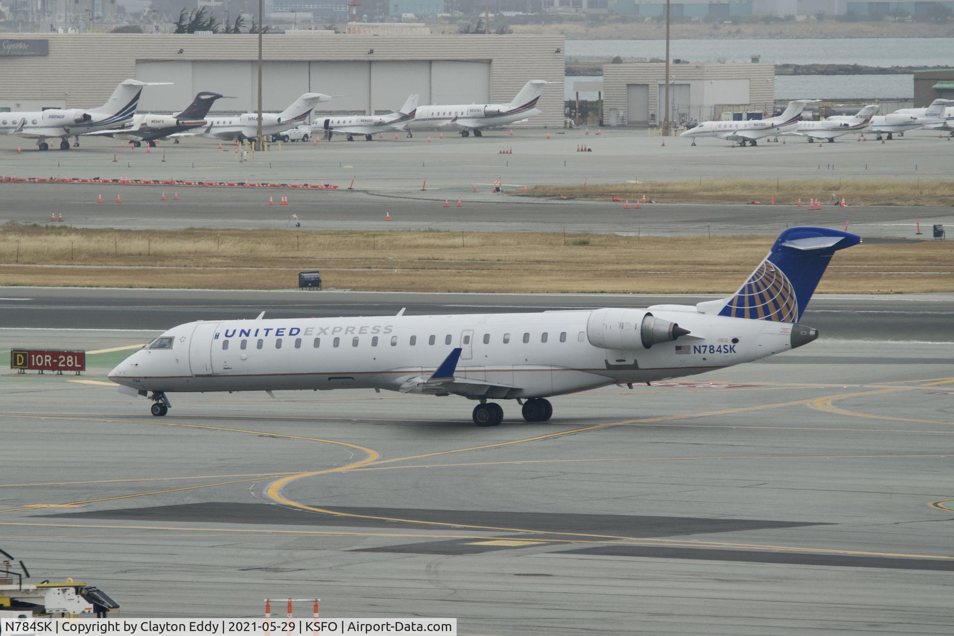 N784SK, 2009 Bombardier CRJ-700 (CL-600-2C10) Regional Jet C/N 10284, Skyterrace SFO 2021.
