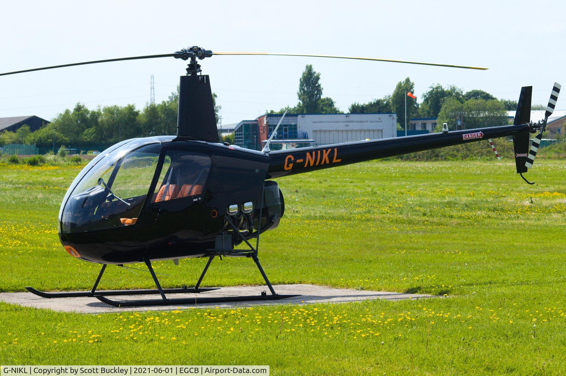 G-NIKL, 1991 Robinson R22 Beta C/N 1800, G-NIKL at EGCB (Manchester Barton)