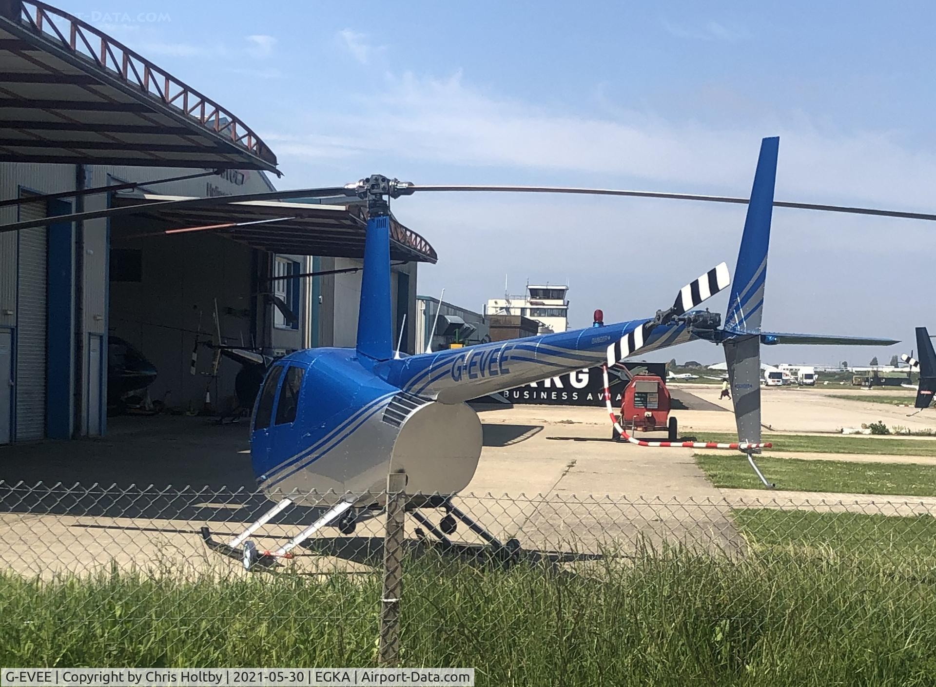 G-EVEE, 2005 Robinson R44 Raven C/N 1517, Parked at Helicopter hangar Shoreham Airport in its new livery