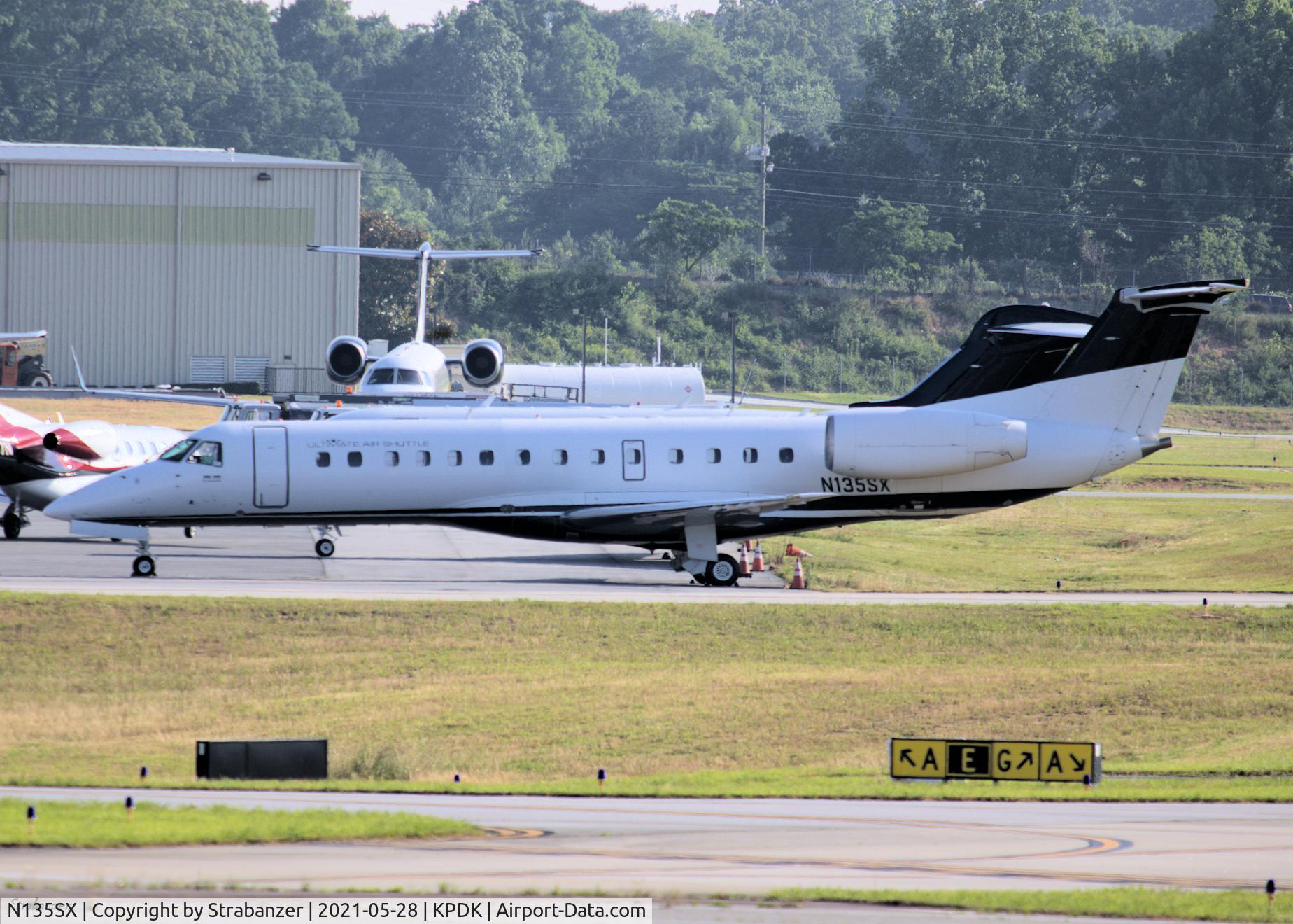 N135SX, 2003 Embraer ERJ-135LR (EMB-135LR) C/N 145728, Flying in Ultimate Air Shuttle colors.   After a flight from Cincinnati Municipal Lunken (KLUK)