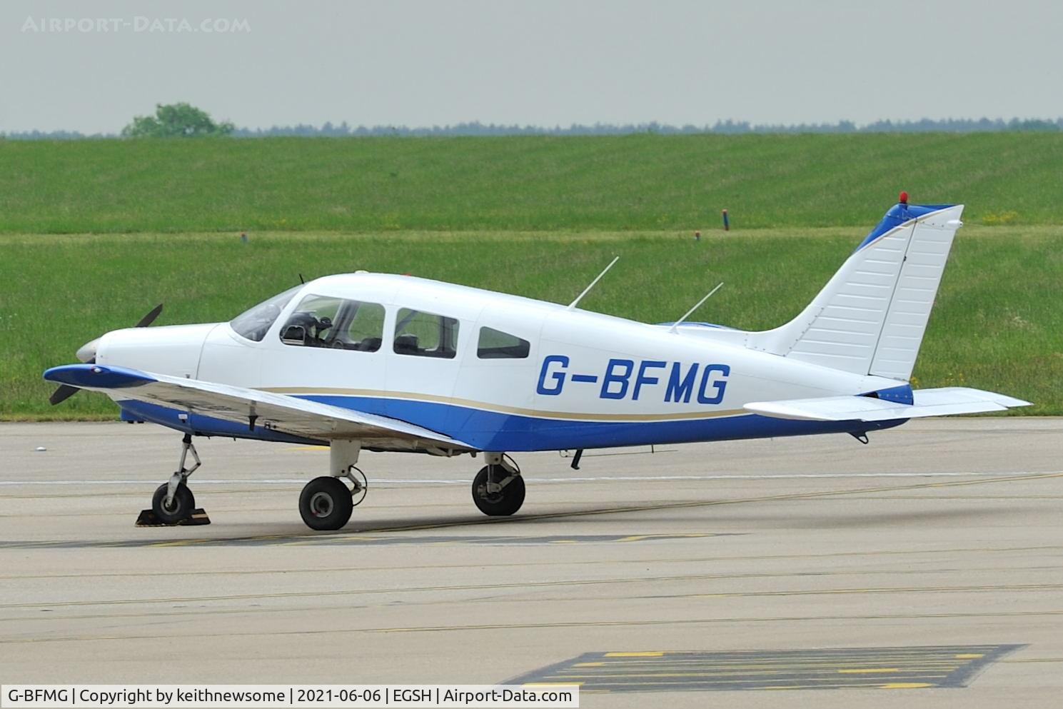 G-BFMG, 1977 Piper PA-28-161 Cherokee Warrior II C/N 28-7716160, Parked at Norwich with later colour scheme.