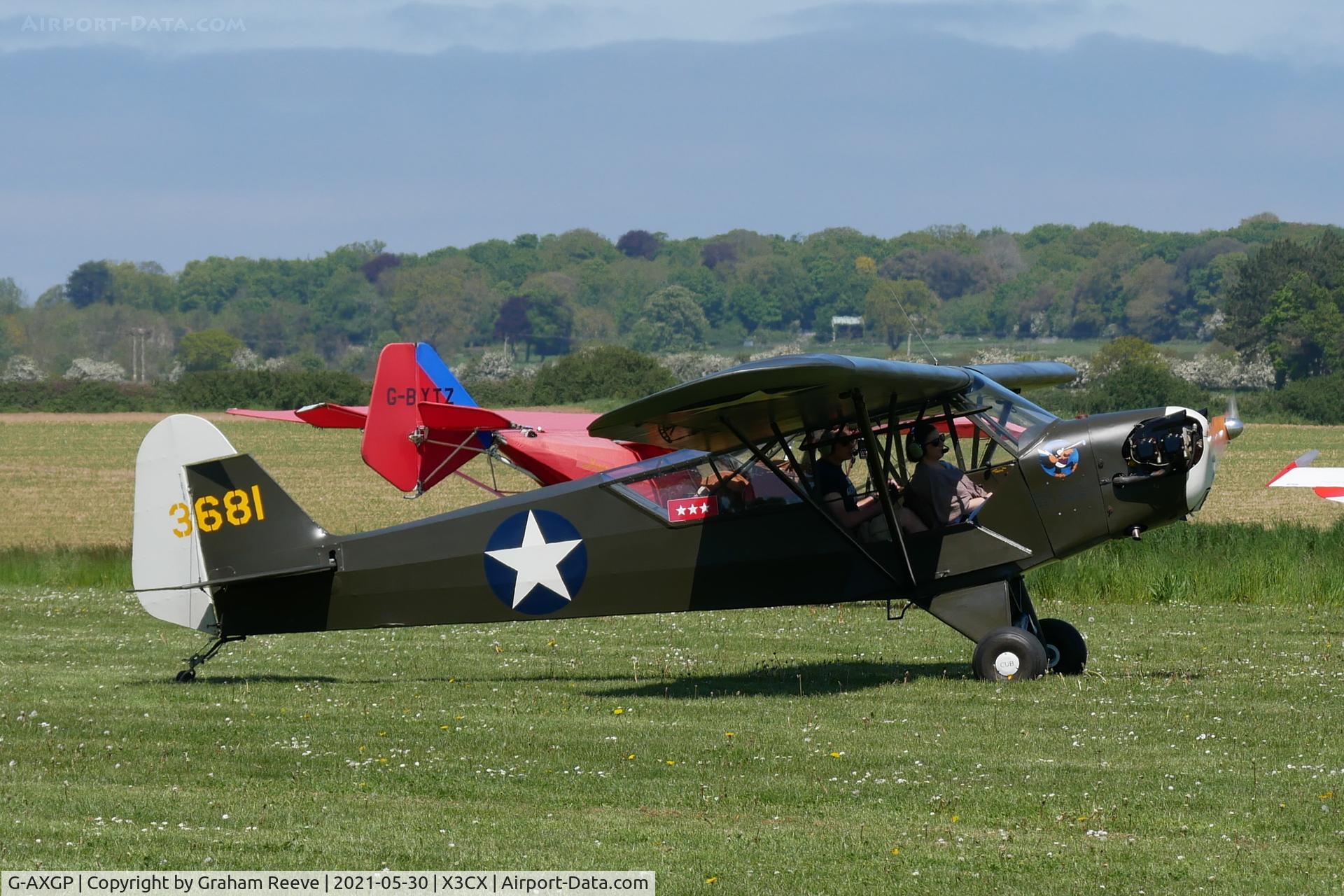 G-AXGP, 1942 Piper J3C-90 Cub C/N 9542, Just landed at Northrepps.