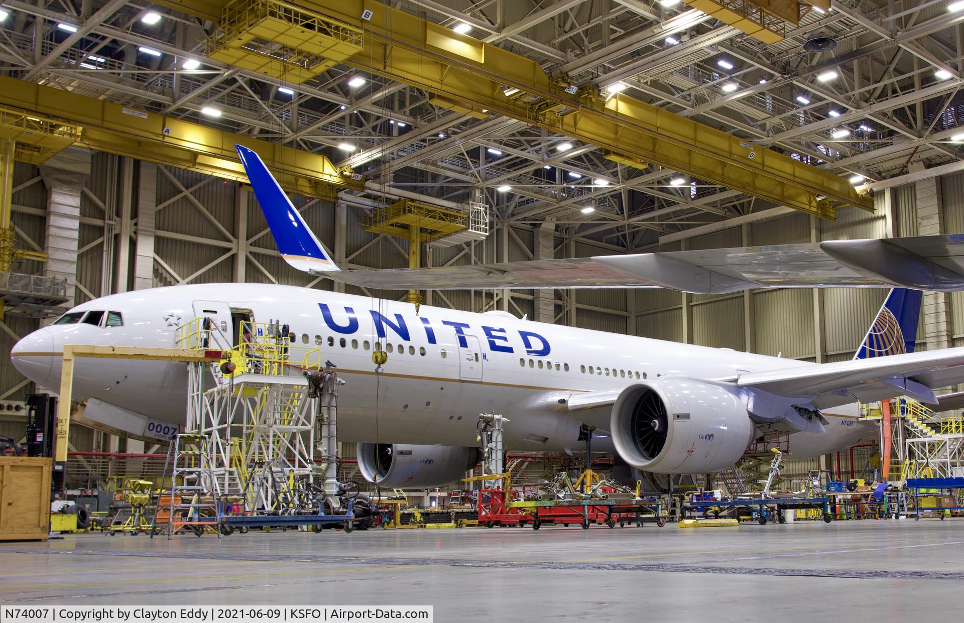 N74007, 1999 Boeing 777-224 C/N 29477, Gear change. SFO. 2021.