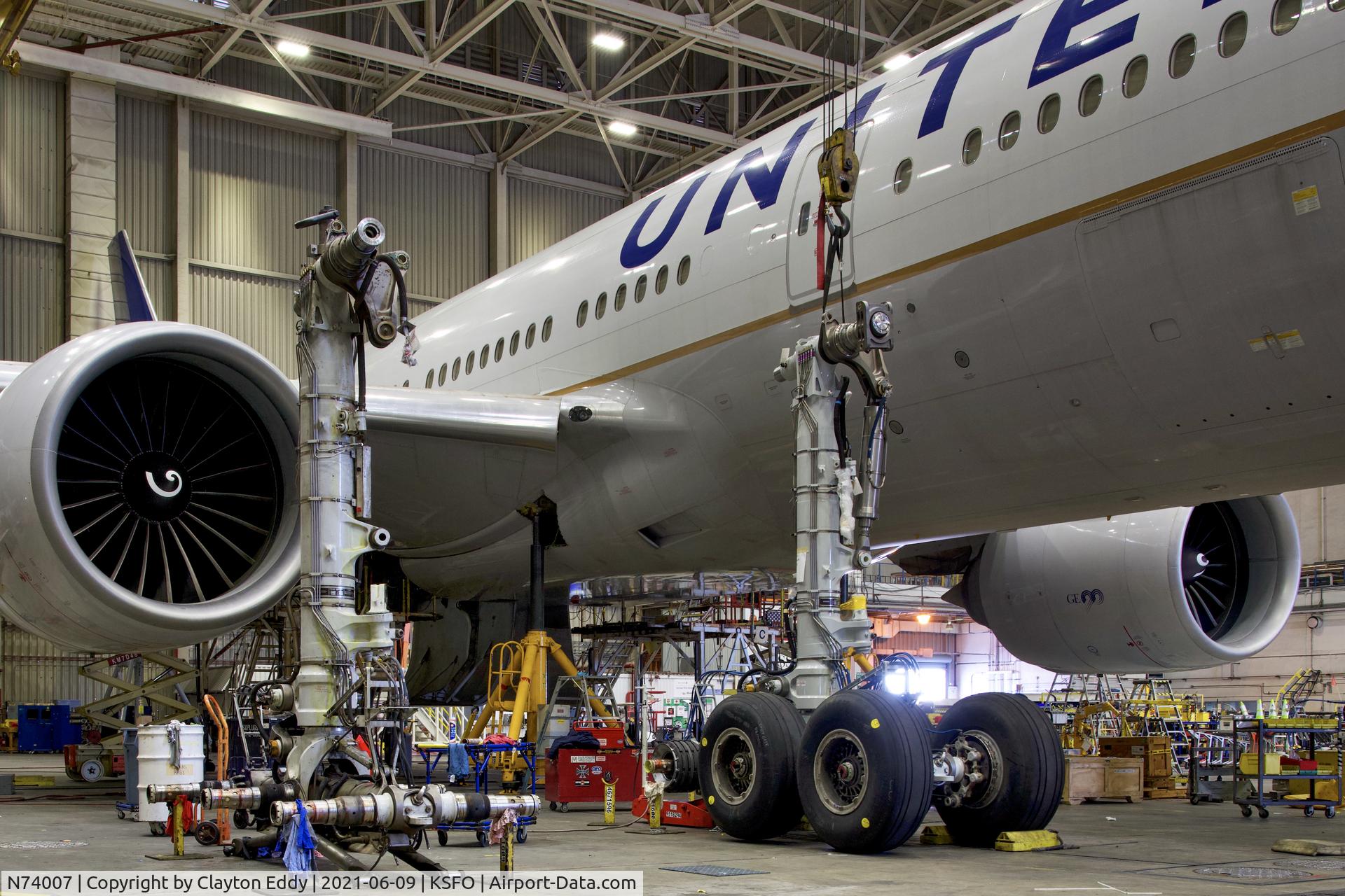 N74007, 1999 Boeing 777-224 C/N 29477, Gear change. SFO. 2021.