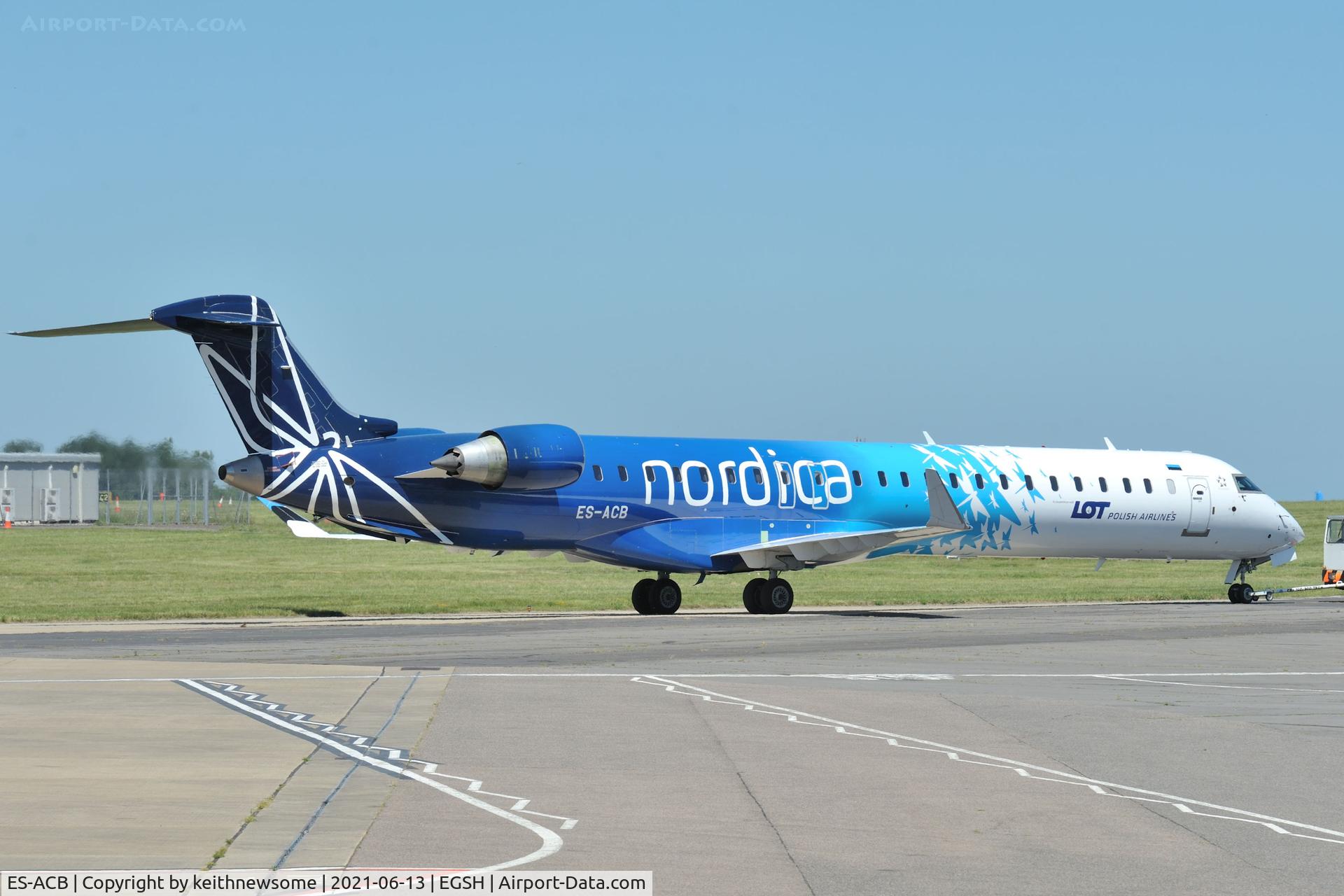 ES-ACB, 2010 Bombardier CRJ-900ER (CL-600-2D24) C/N 15261, Towed to spray shop.