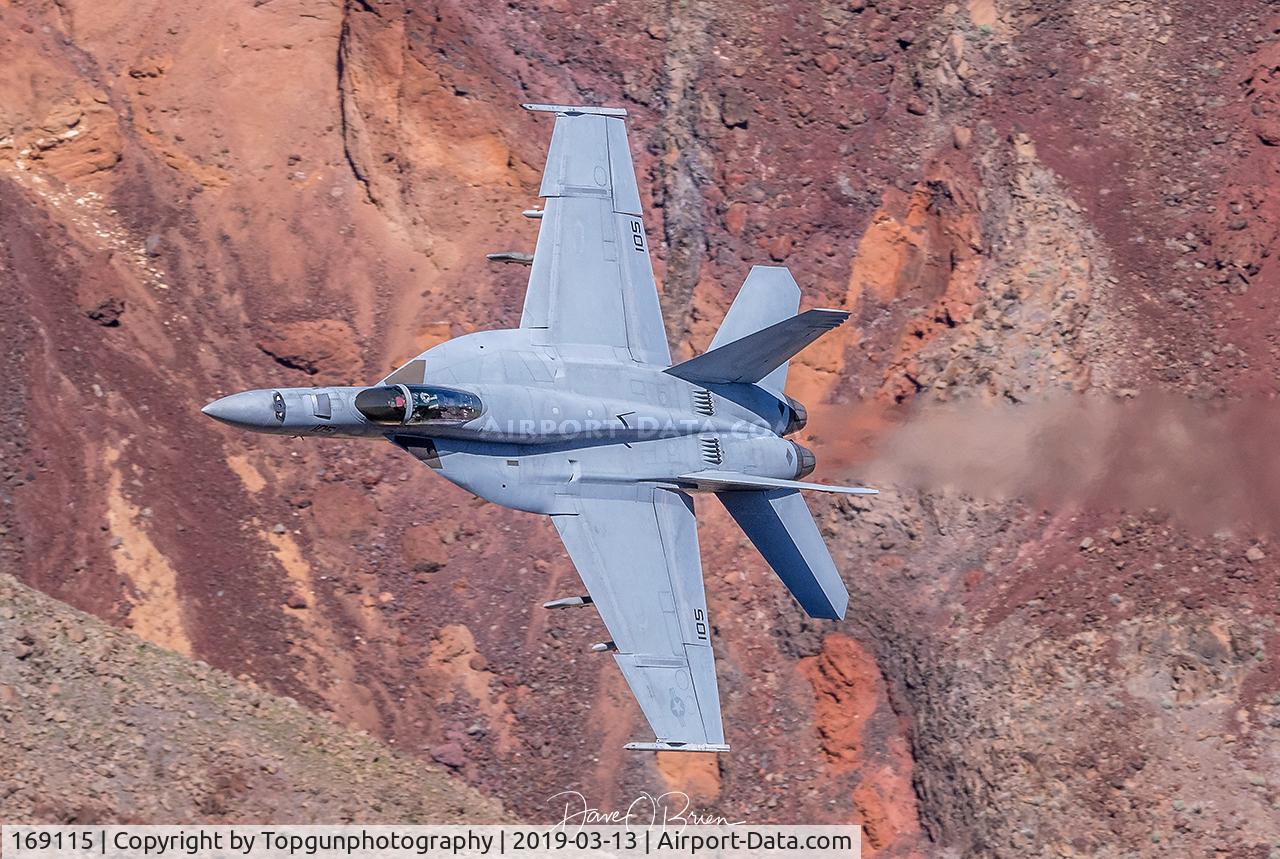 169115, Boeing F/A-18E Super Hornet C/N E-289, NIGHT32 VFA-143 Pukin Dogs, wingman following through Star Wars Canyon
